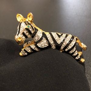 Gold tone zebra pin